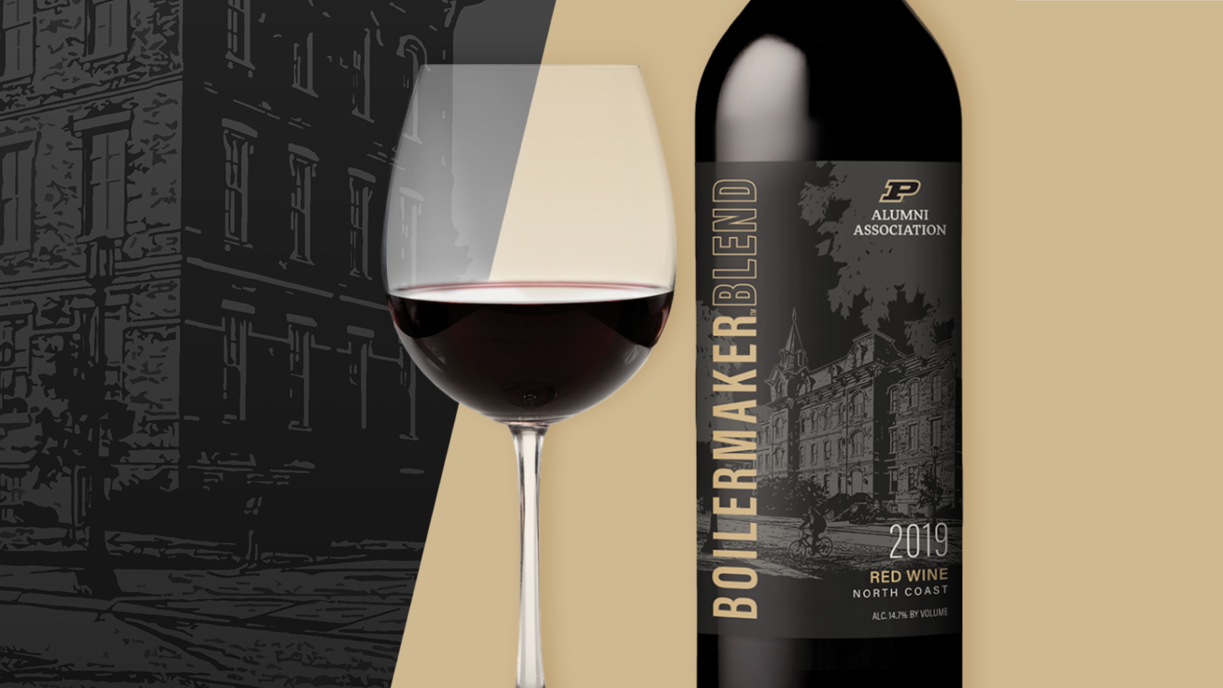 The image shows a glass of wine and a bottle of Boilermaker Blend wine