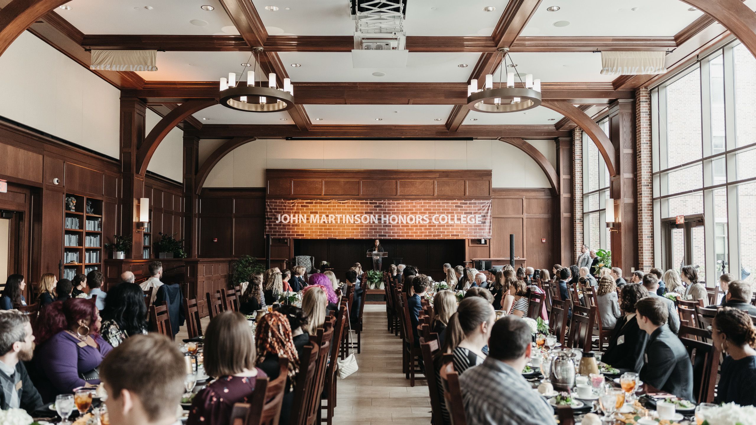 The image shows the John Martison Honors College 