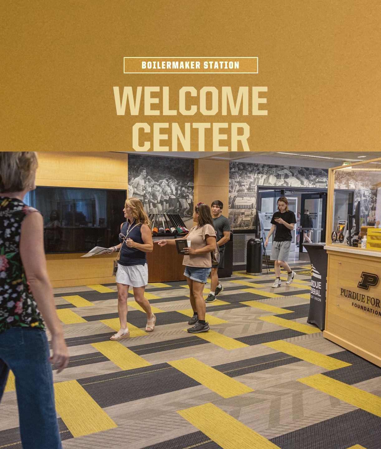 The image shows people in Boilermaker Station Welcome Center