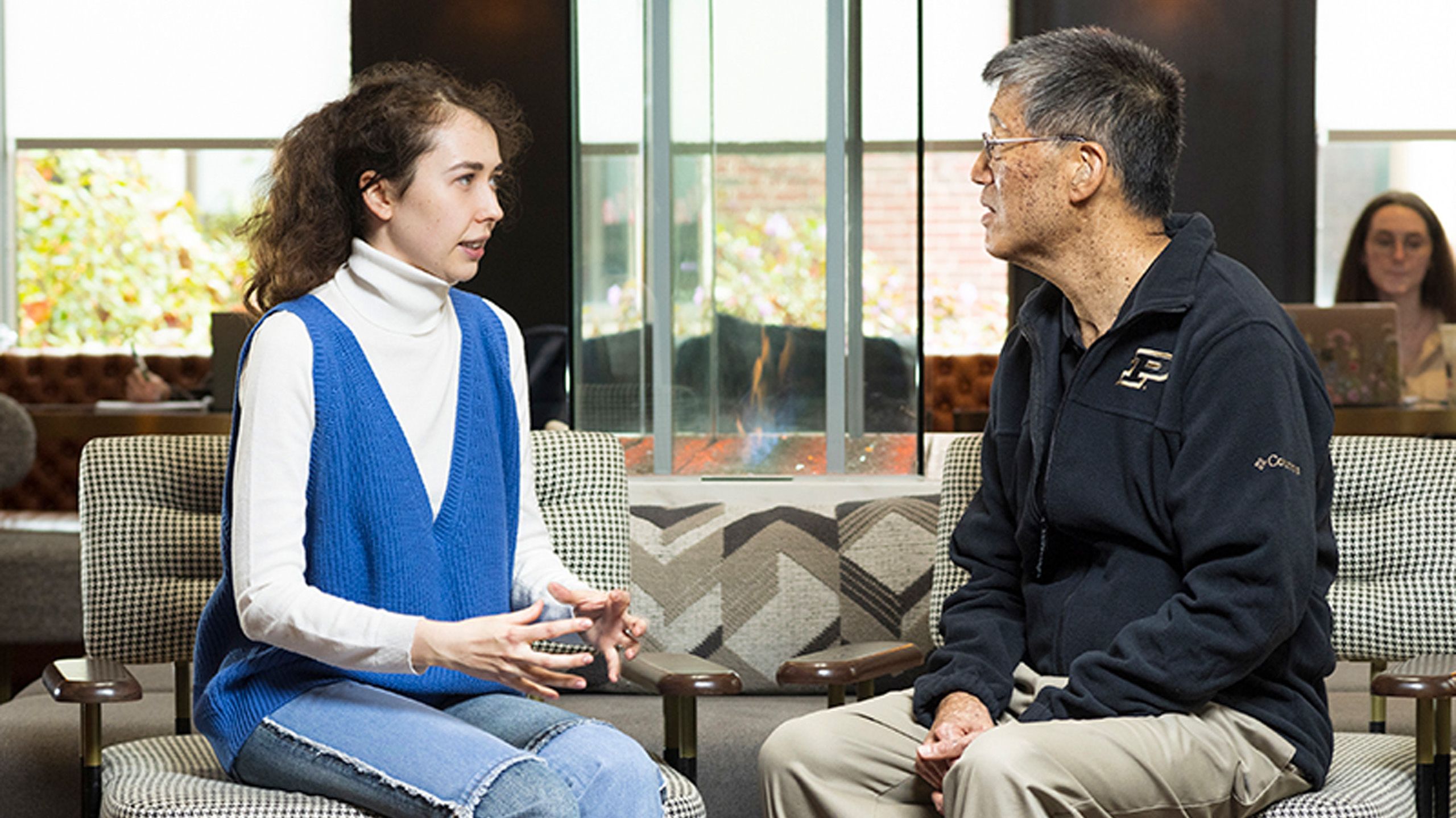 Ukrainian scholar Valeria Yatsenko and Crestview Apartments owner William Shen