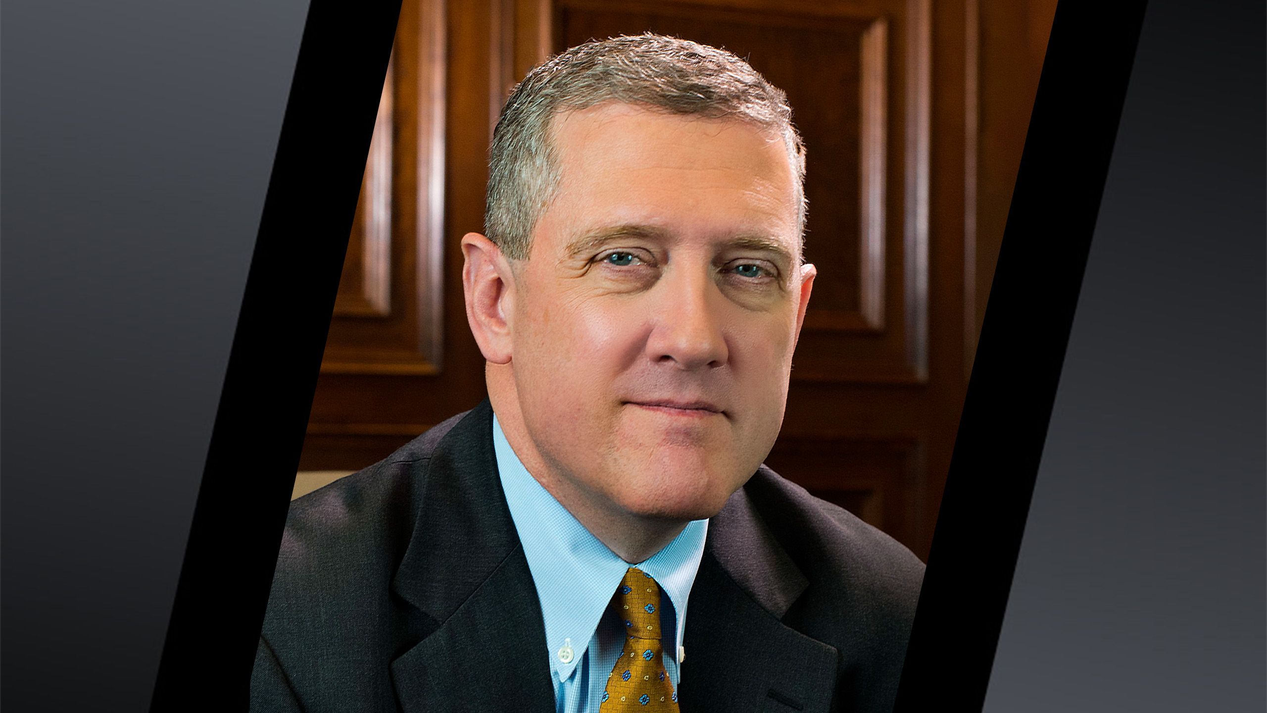 Jim Bullard wearing a suit