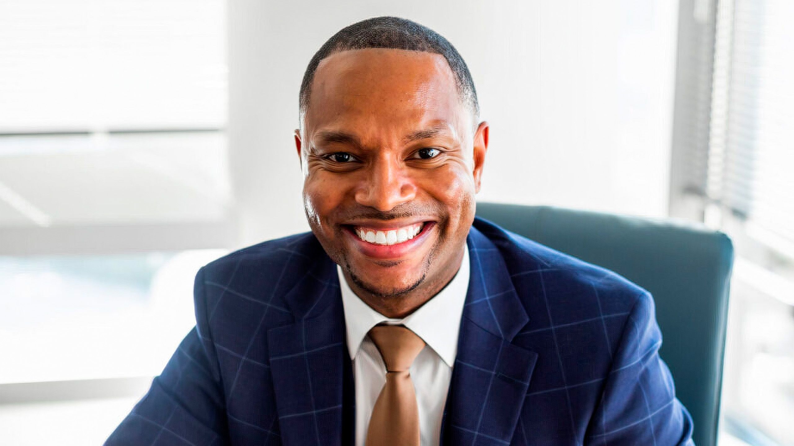 Brian Ford in a blue suit