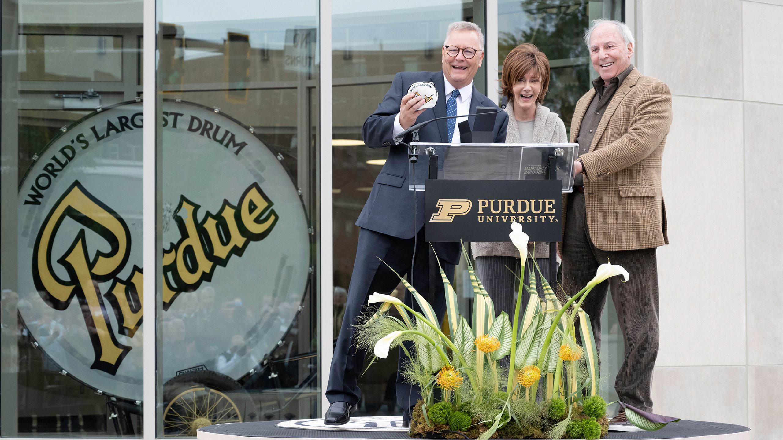 Jay Gephart, the Al G. Wright Chair and director of bands and a professor of music; Sharon Hagle; and Marc Hagle