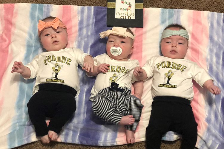 The image shows the Sharp triplets