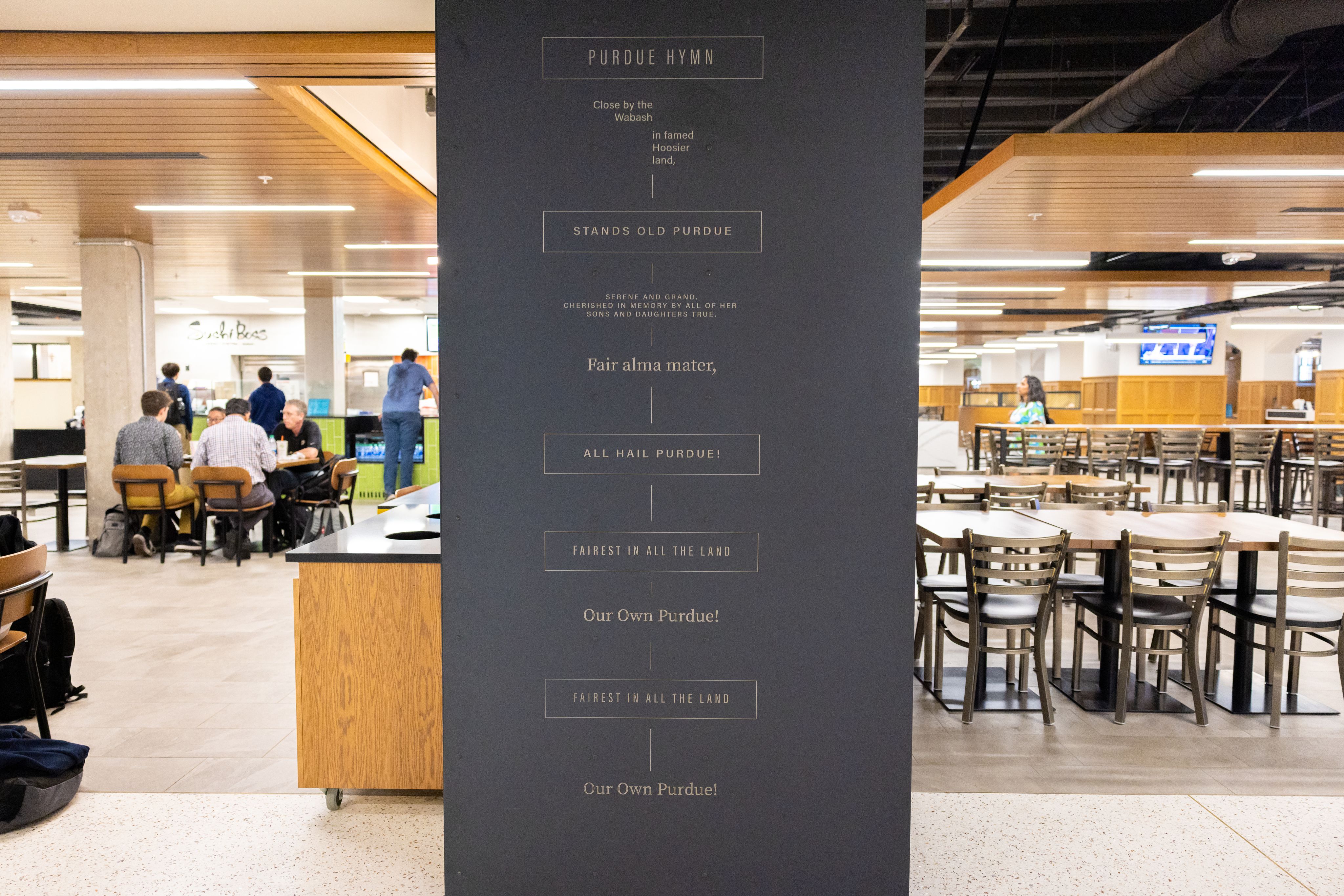 Metal column etched with lyrics to the Purdue Hymn
