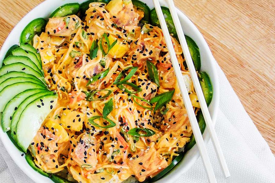 Poke bowl garnished with vegetables