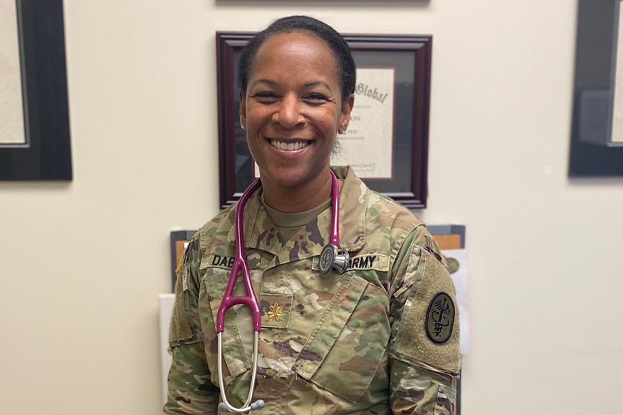 The image shows Krystal Dabon, a Purdue Global alumna