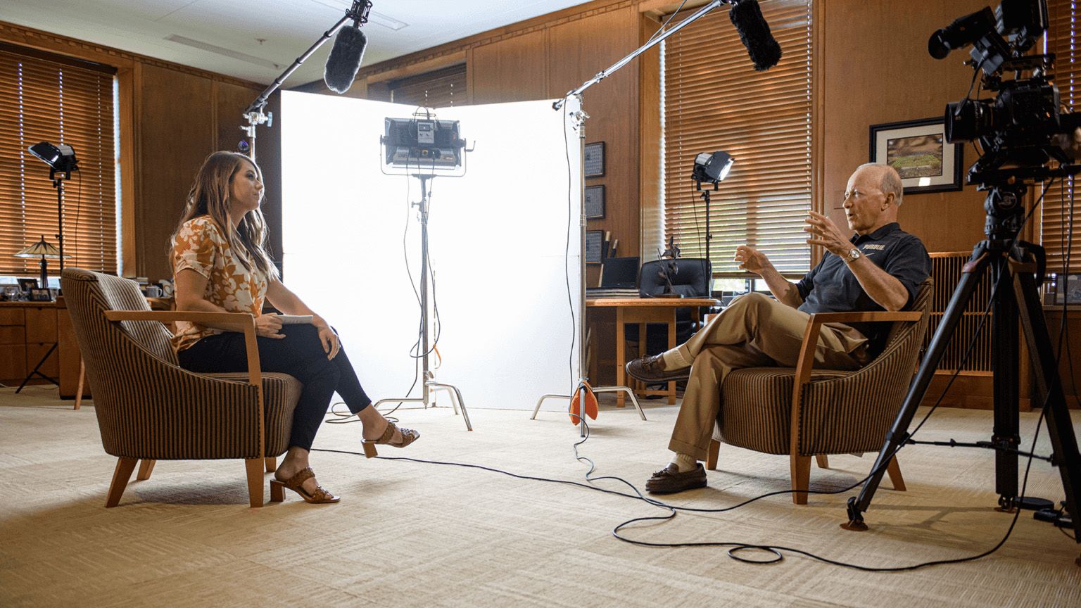 Interview with Kate Young sitting opposite President Mitch Daniels