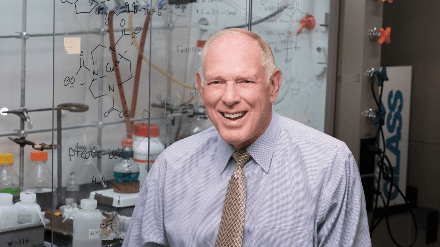 Photo of Philip Low in a laboratory