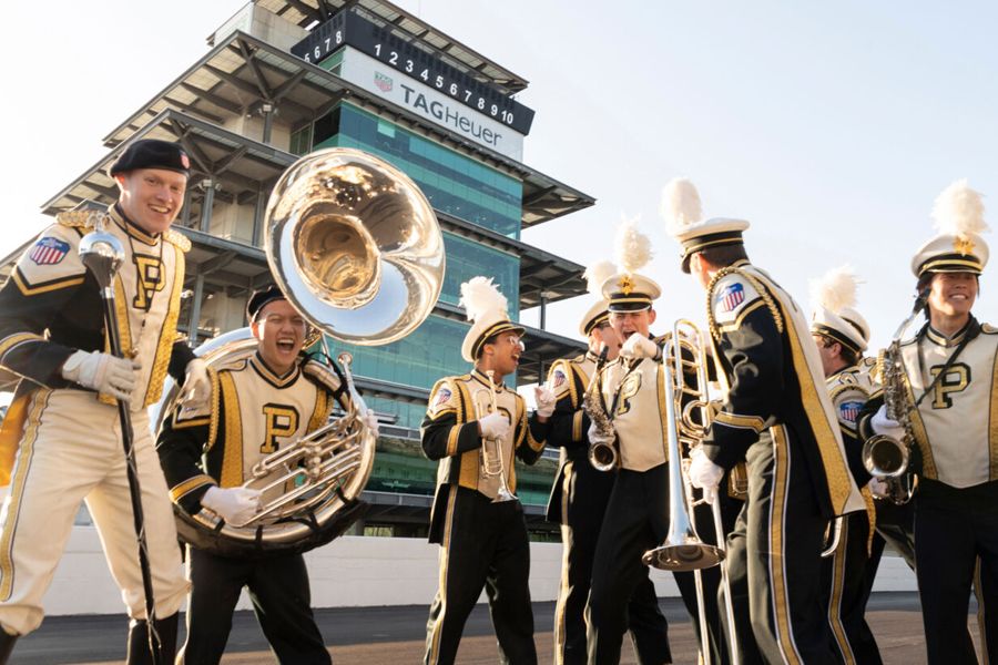 The image shows Purdue band members