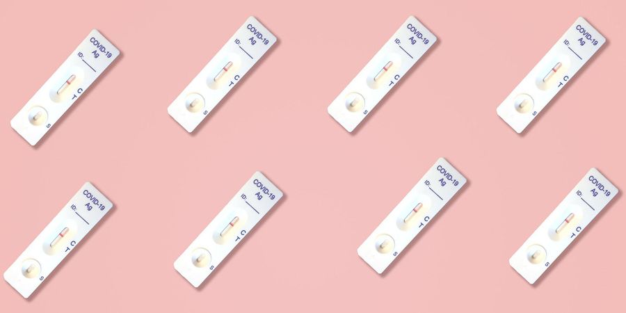 The image shows COVID-19 tests