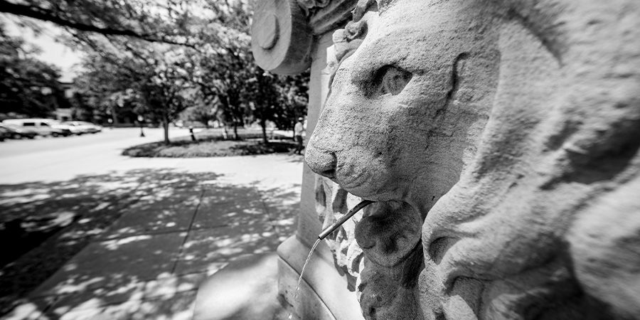 The image shows a closeup of the Purdue Lion Fountain